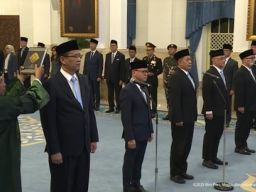 Membaca Arah Reshuffle